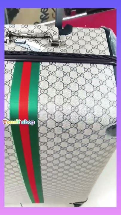 fake gucci trolly bag